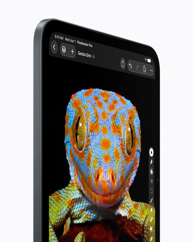 Close-up of the new iPad mini showing a colourful gecko on its OLED display